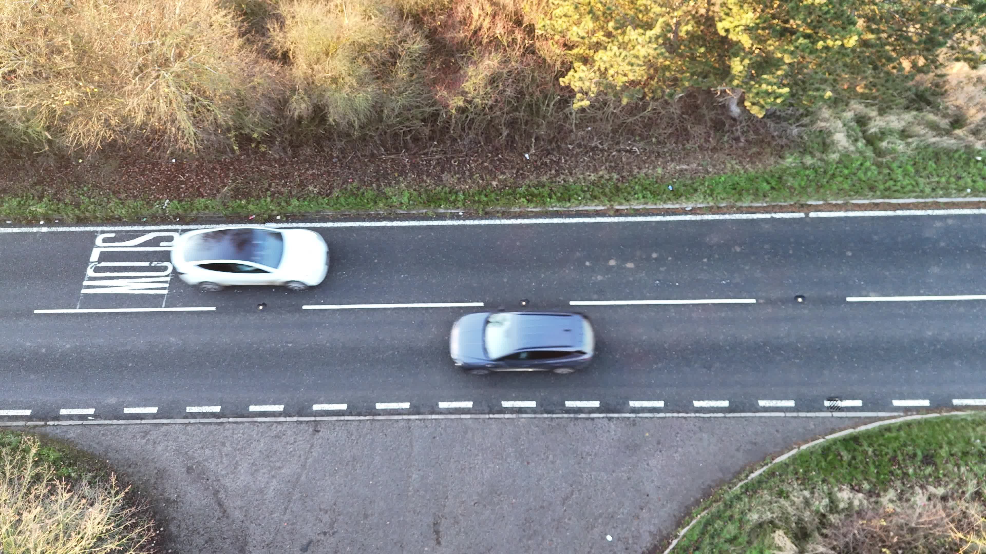 Aerial View of Two Cars on Countryside Highway Free Stock Video Footage ...