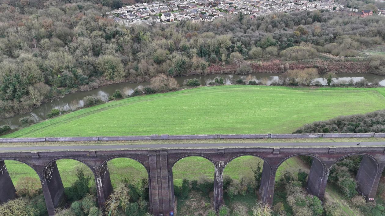 Aerial View of Scenic Bridge and Lush Landscape Free Stock Video ...
