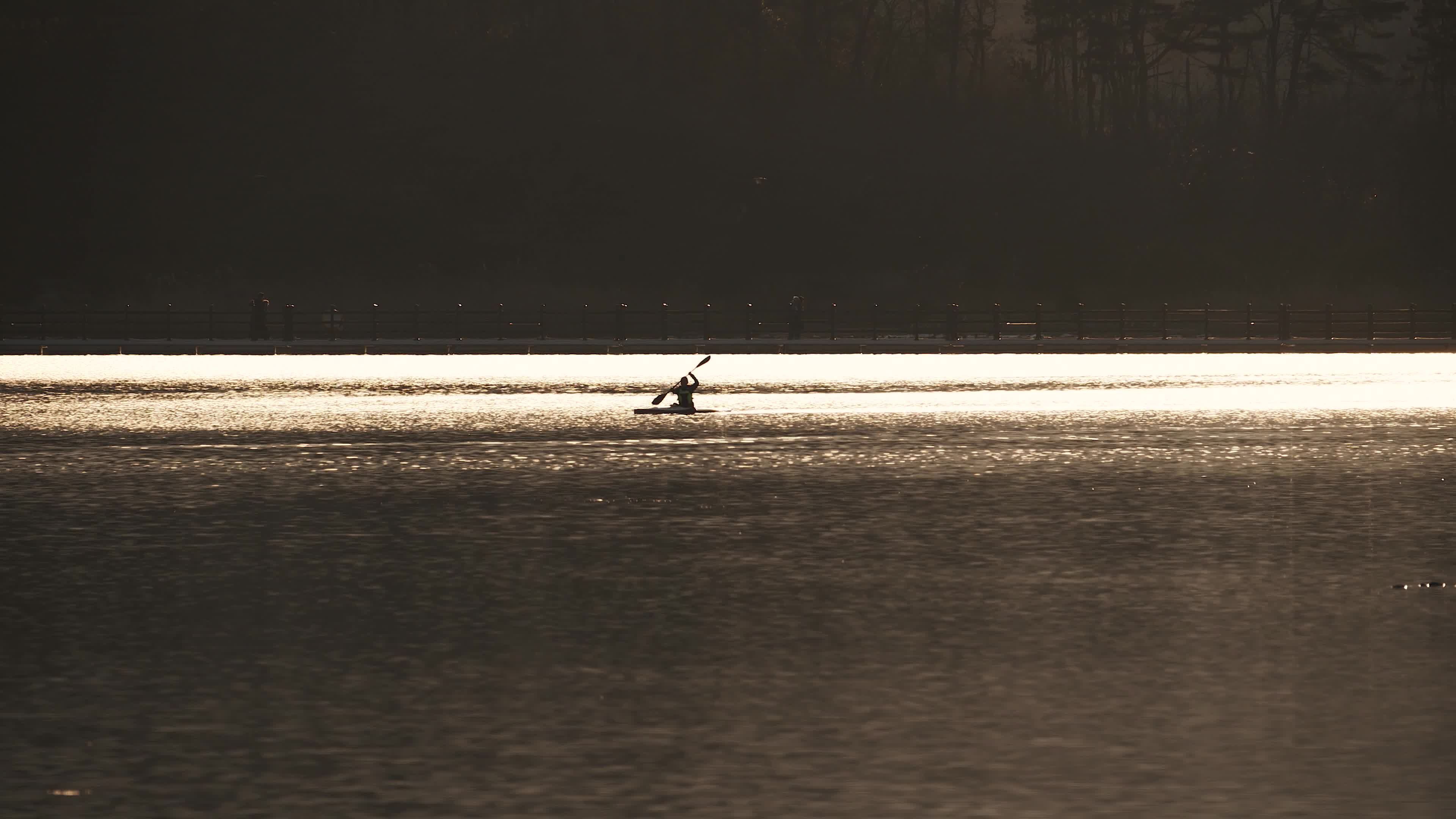 Serene Kayaking on a Tranquil Lake at Sunset Free Stock Video Footage ...