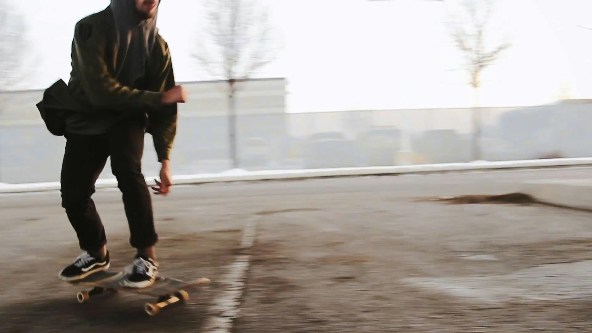 Slow Motion Footage Of A Skateboarder Doing Tricks On the Street Side ...