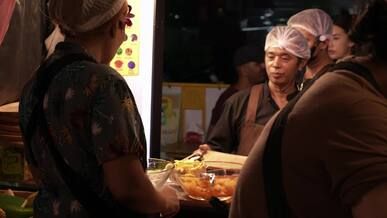 vibrant night market street food in bangkok
