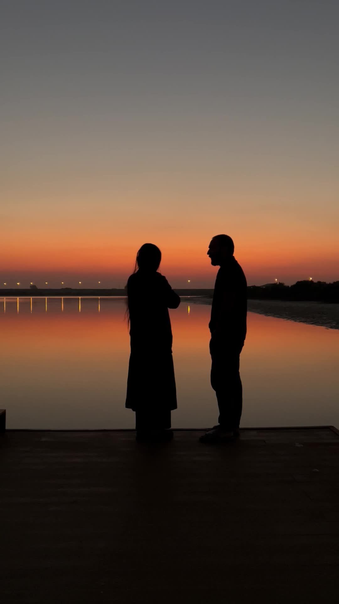 Silhouette of a Couple at Sunset by a Lake Free Stock Video Footage ...