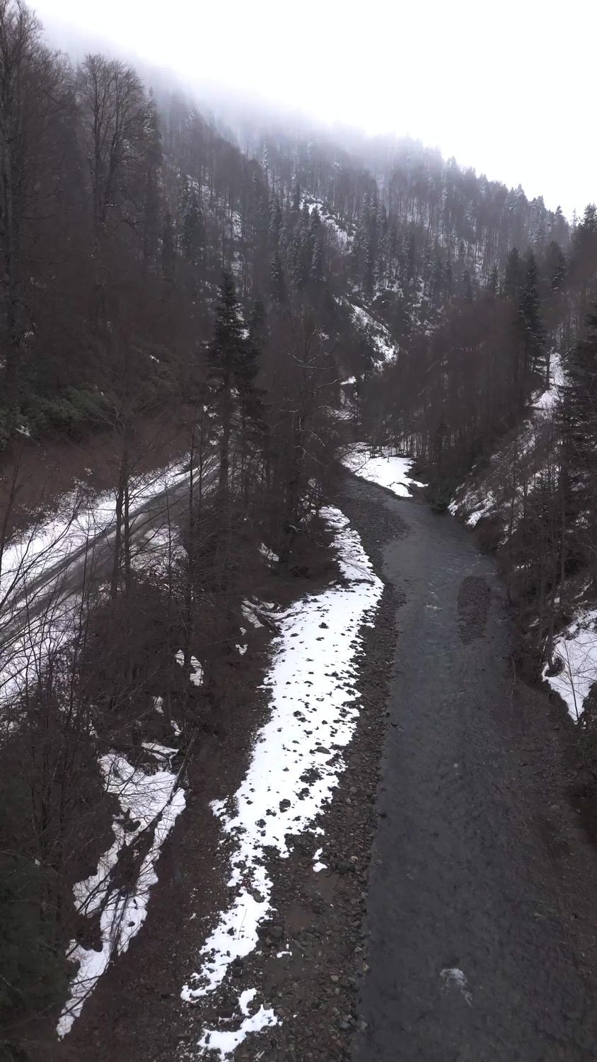 Aerial View of Snowy Mountain Road in Winter Free Stock Video Footage ...