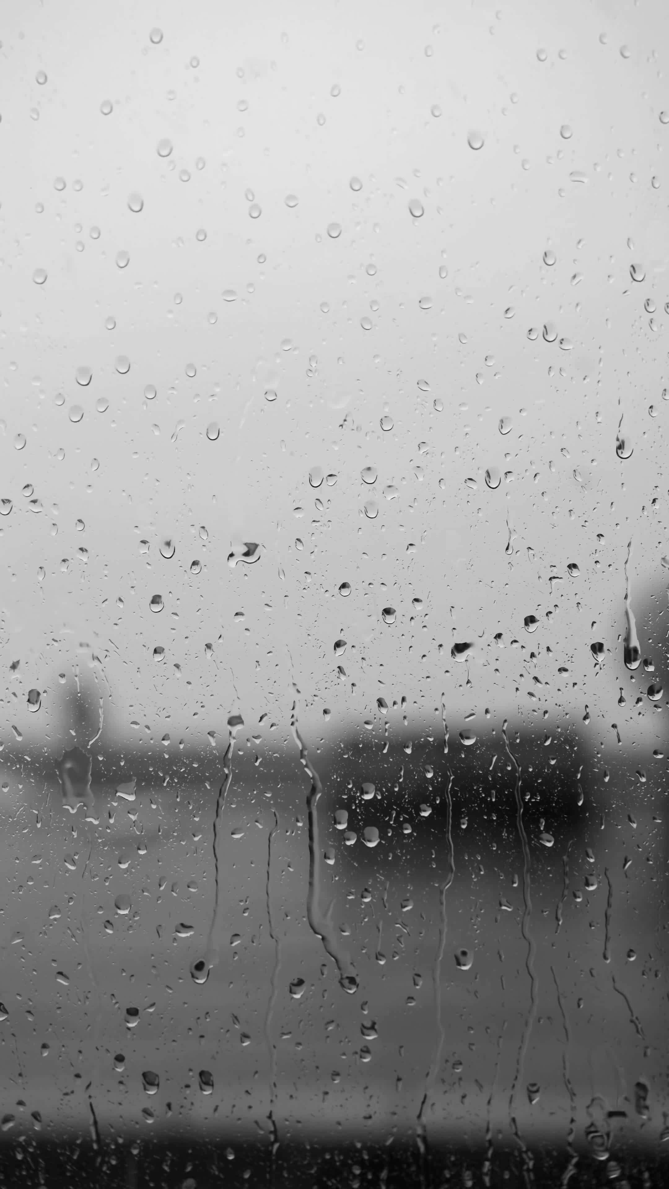 raindrops on window creating melancholic scene 29886727