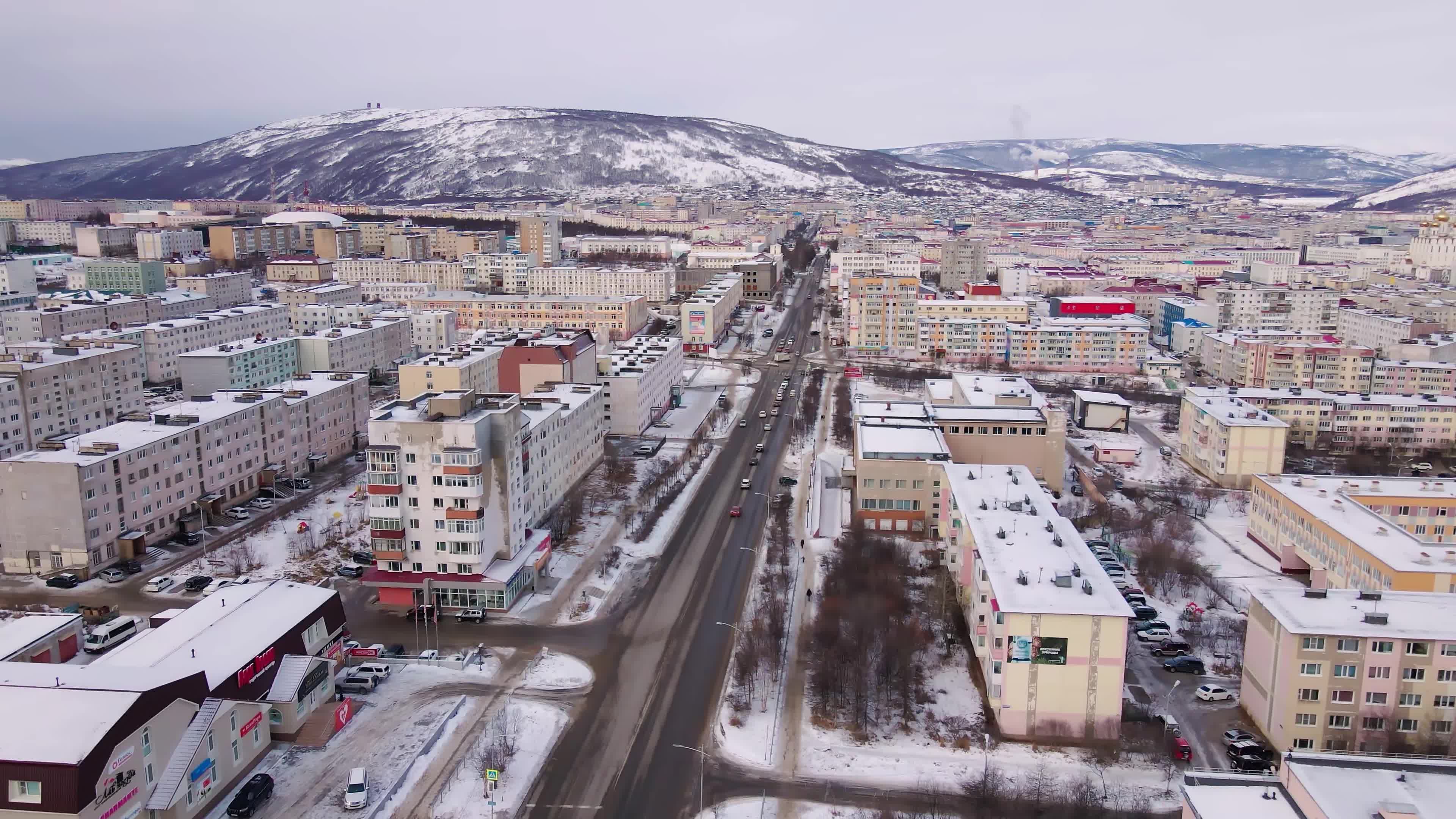 Aerial View of Snowy Urban Cityscape in Winter Free Stock Video Footage ...