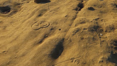 Dried Land With A Heart-Shaped Carving