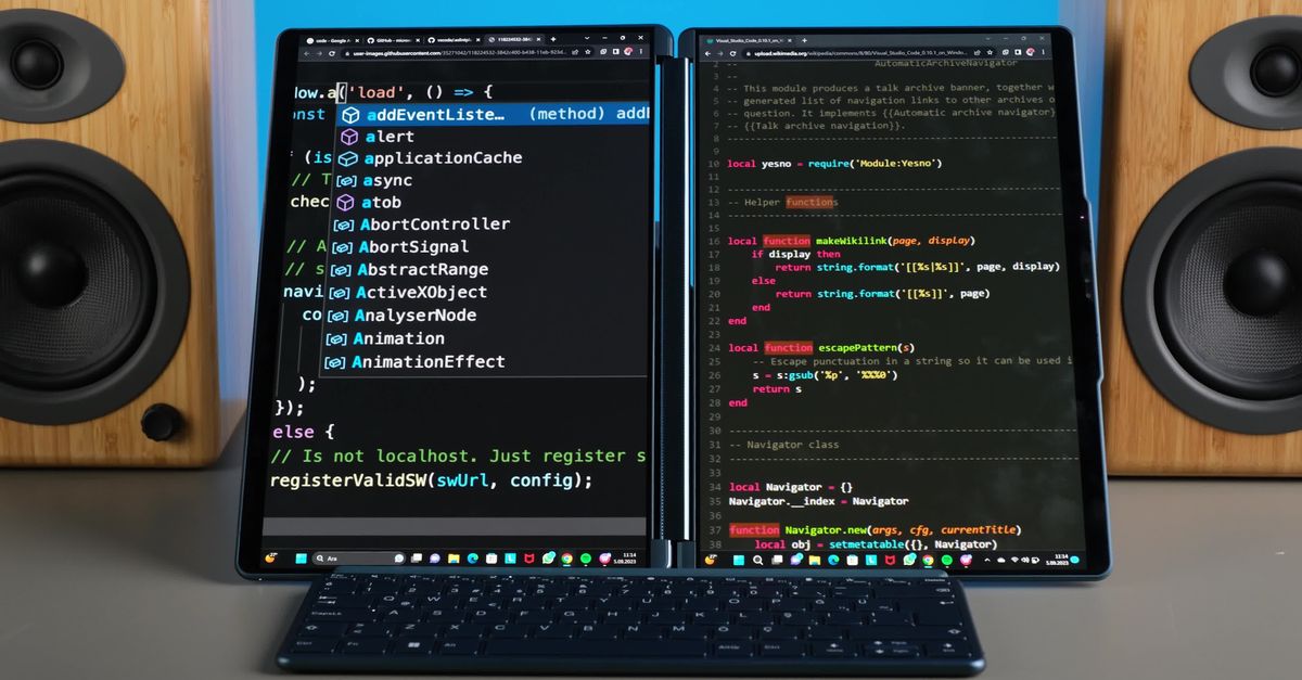 Dual Screen Coding Setup with Speakers Free Stock Video Footage ...