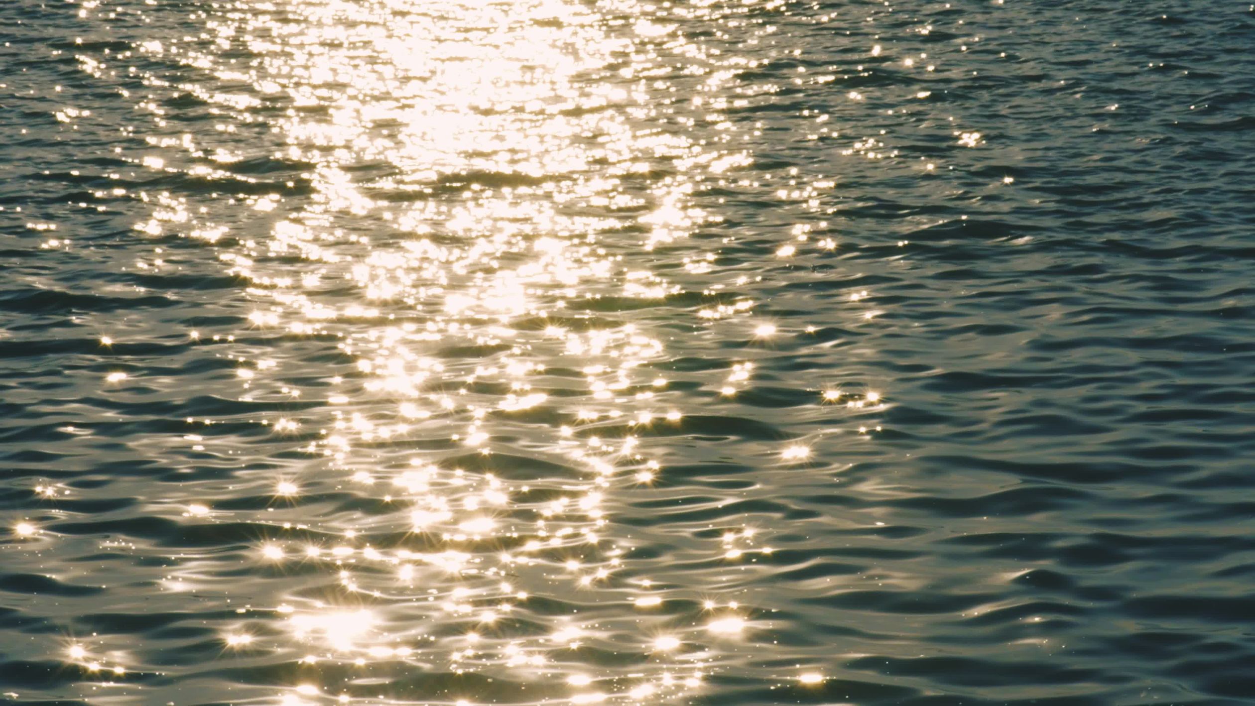 Sunlight Reflecting on Calm Ocean Waves Free Stock Video Footage ...