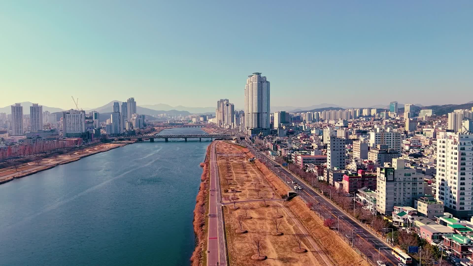 Aerial View of Urban Cityscape Alongside River Free Stock Video Footage ...