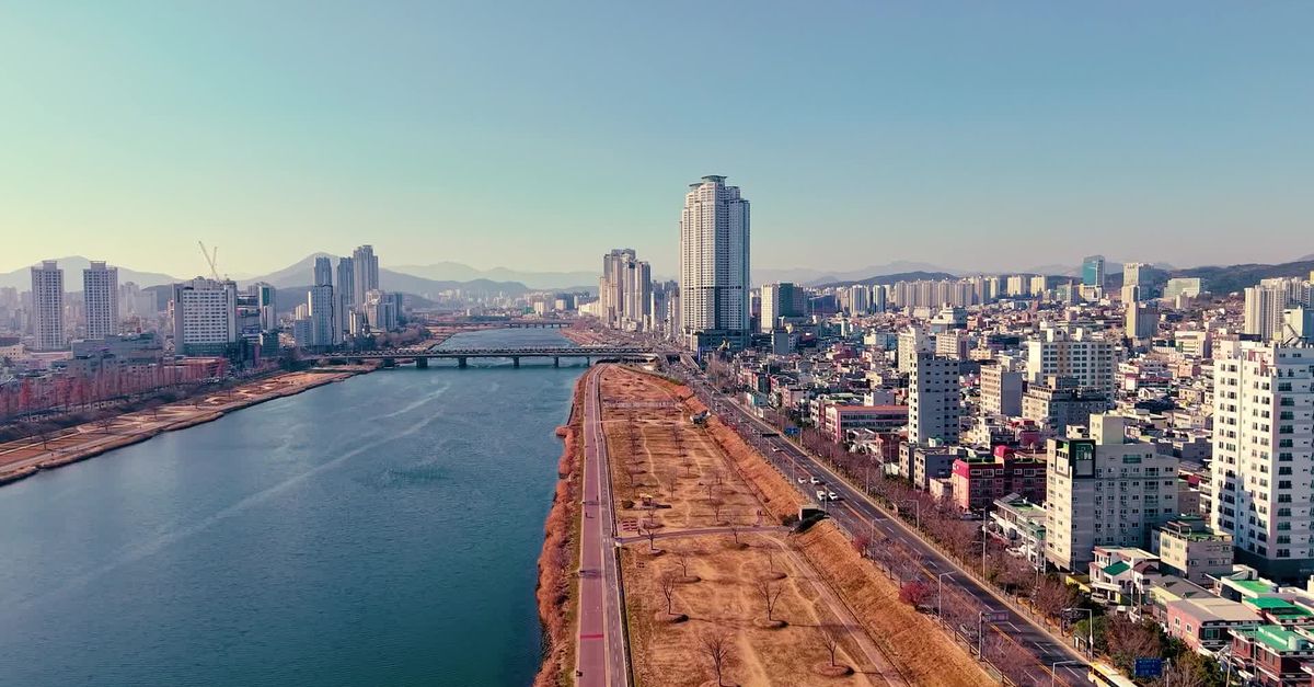 Urban Rivers Photography Aerial View of Urban Cityscape Alongside River Free Stock Video Footage ...
