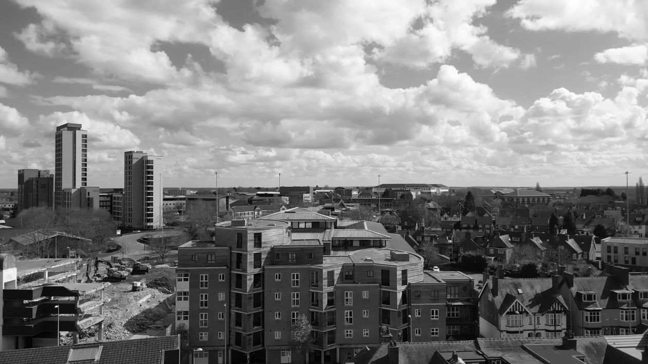 Aerial View of Urban Landscape Under Cloudy Sky Free Stock Video ...