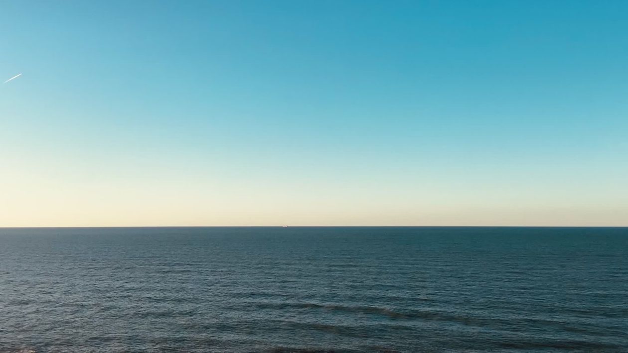 Ocean In The Distance Aerial View of Serene Ocean Horizon at Sunset Free Stock Video Footage ...