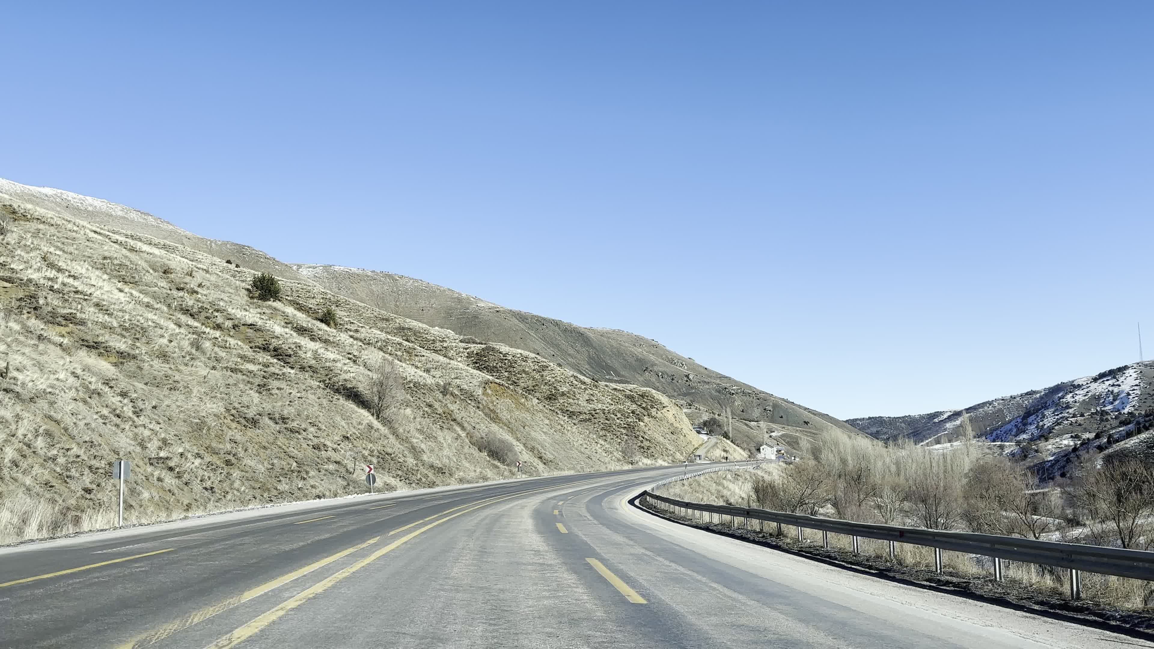 Scenic Mountain Road with Clear Blue Sky Free Stock Video Footage ...