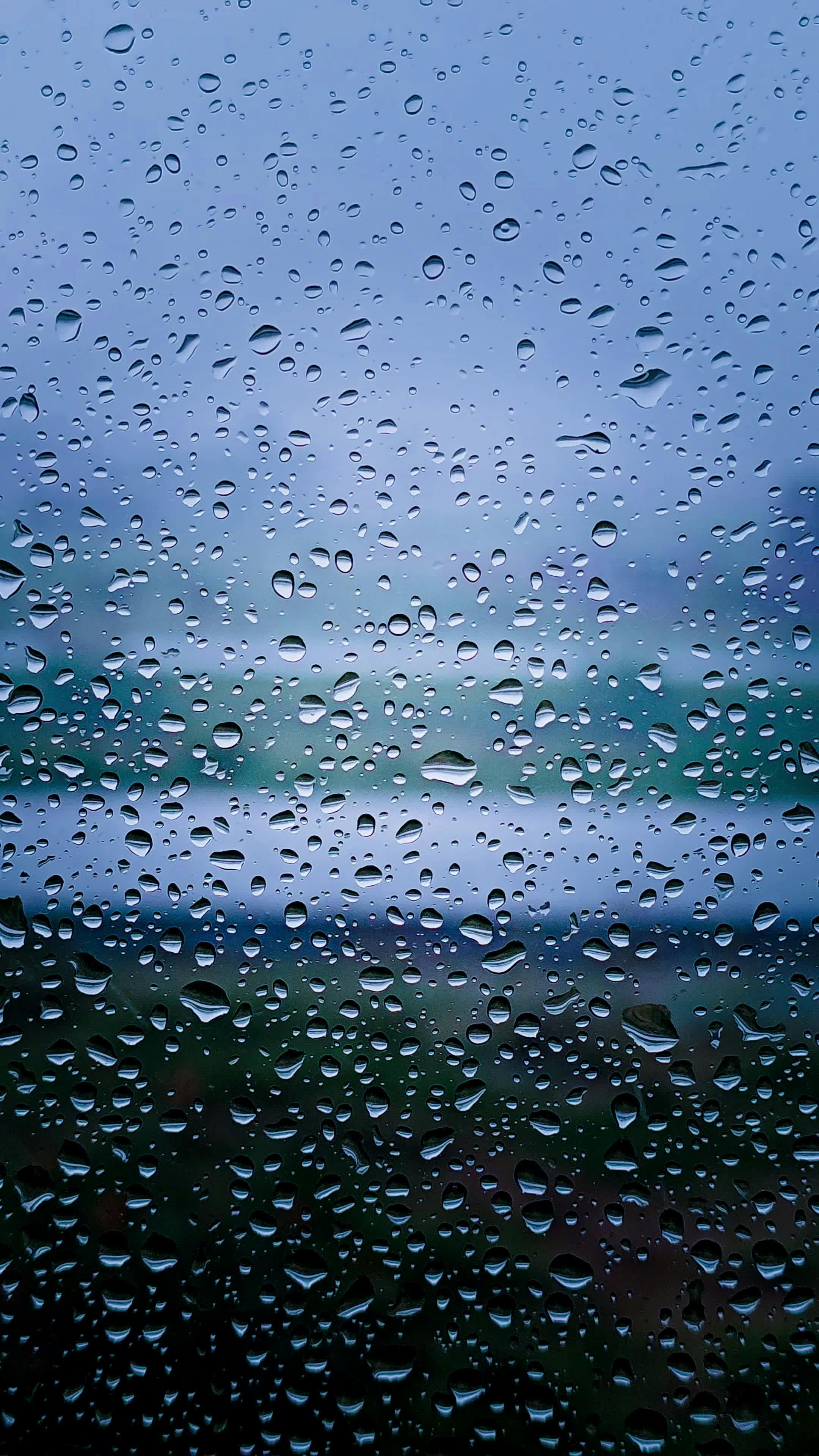 raindrops on glass with scenic background 30133842