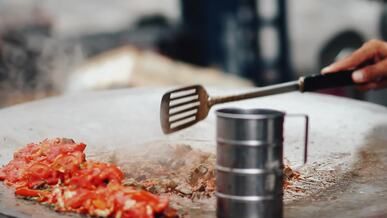 street vendor cooking vibrant pakistani cuisine