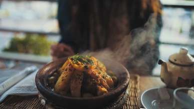 close up footage of a hot dish on a clay pot