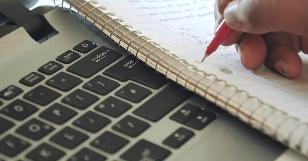 Writing Notebook On Computer Writing Notes on Laptop in Minimalist Workspace Free Stock Video ...