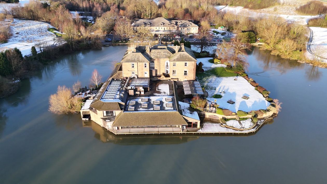 Winter Aerial View of Snowy Island Estate Free Stock Video Footage ...