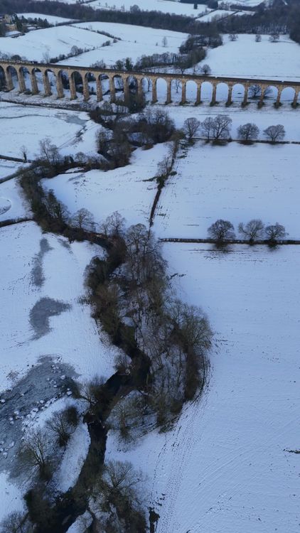 Aerial View of Snowy Landscape with Viaduct Free Stock Video Footage ...