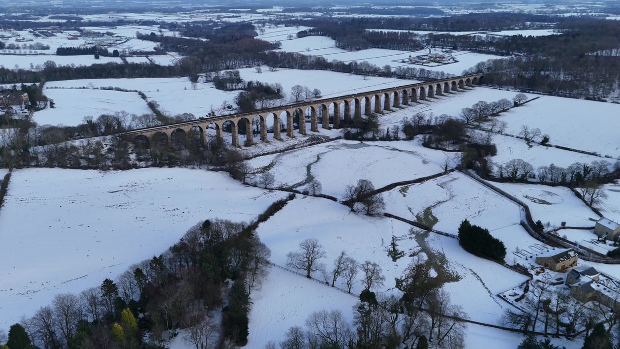 Aerial View of Snowy Viaduct in Winter Landscape Free Stock Video ...