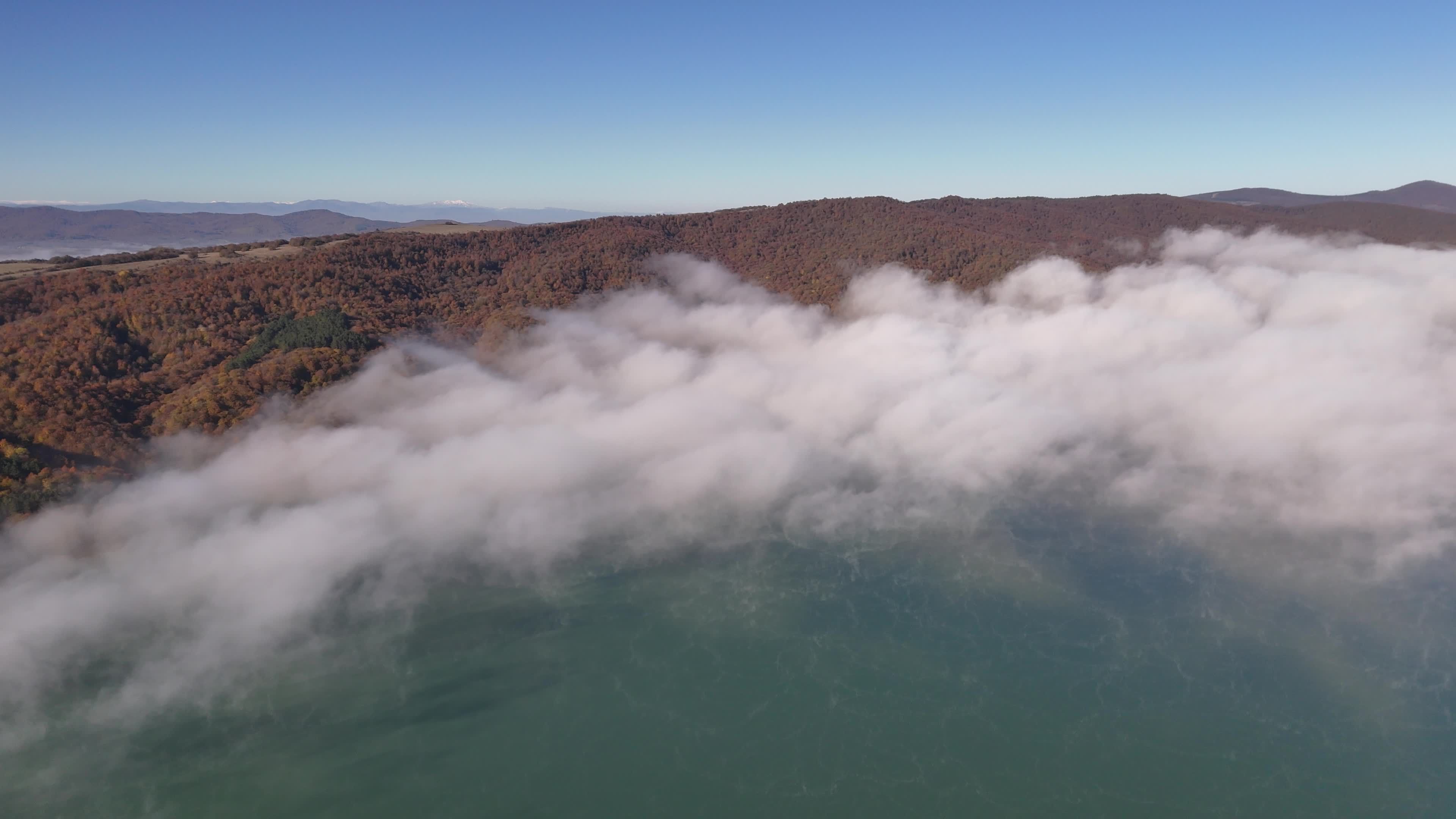 Serene Aerial View of Misty Lakeside Landscape Free Stock Video Footage ...