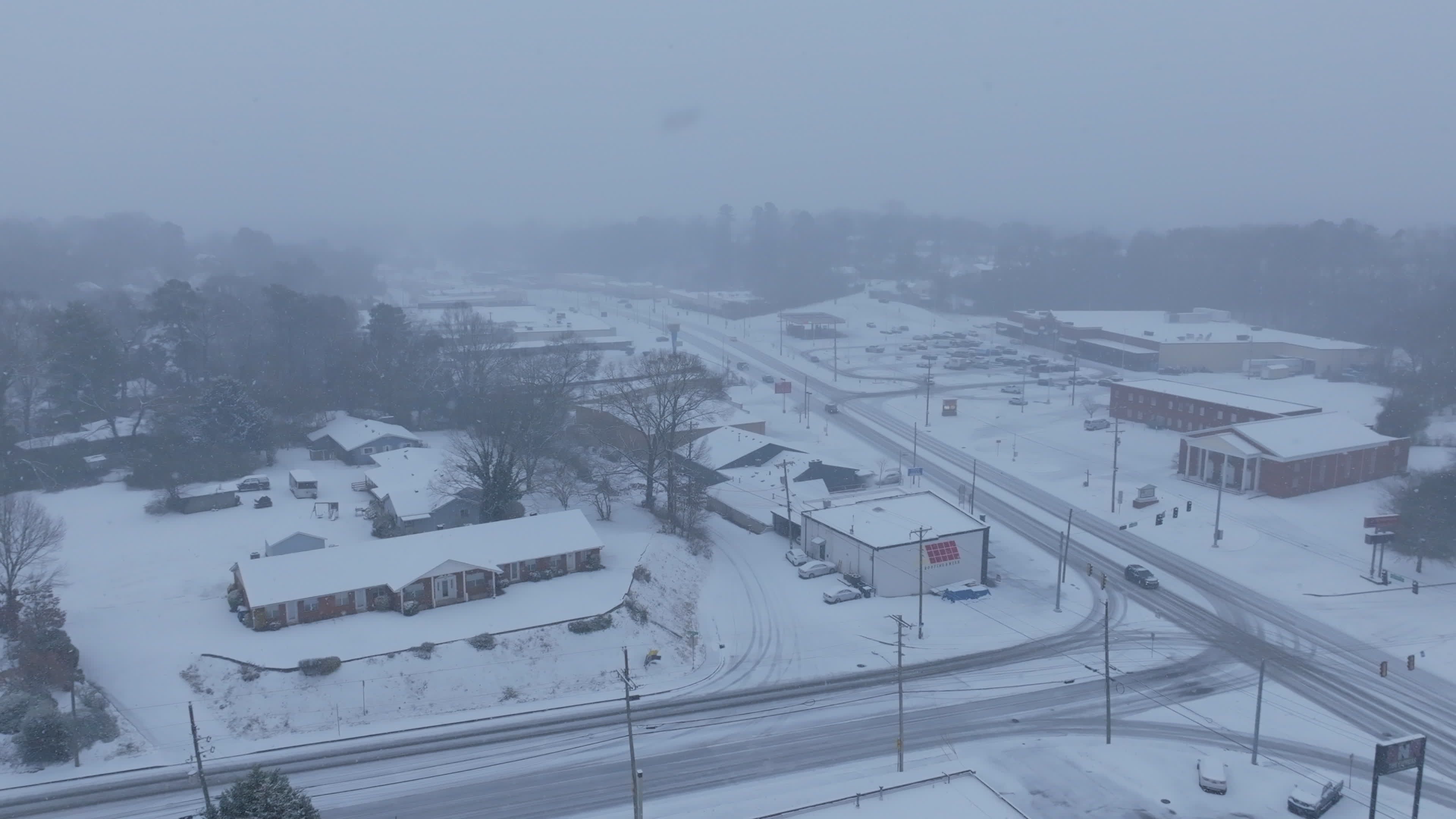 Aerial View of Snowy Town Streets in Winter Free Stock Video Footage ...