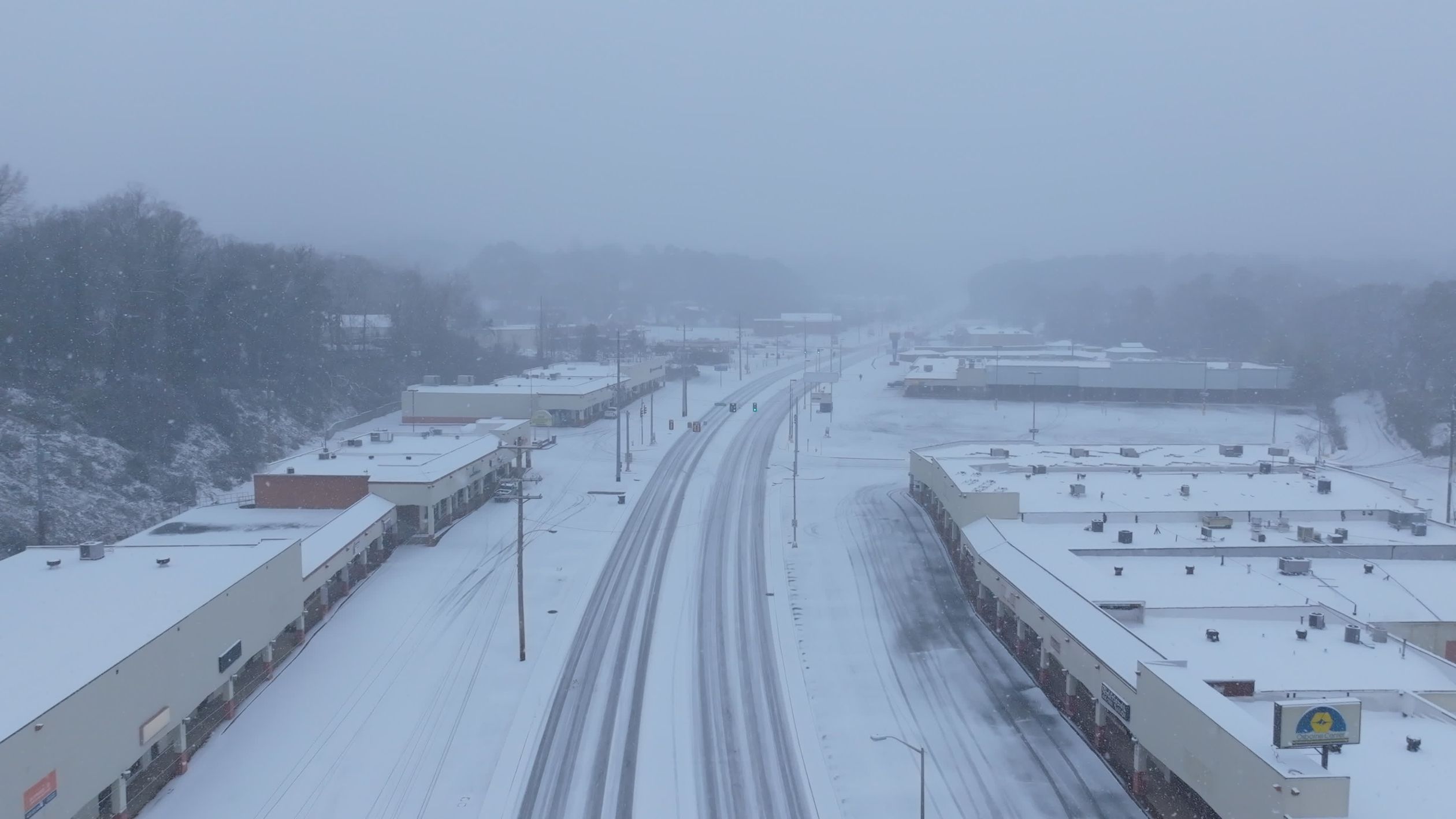 Aerial View of Snow-Covered Suburb Winter Street Free Stock Video ...