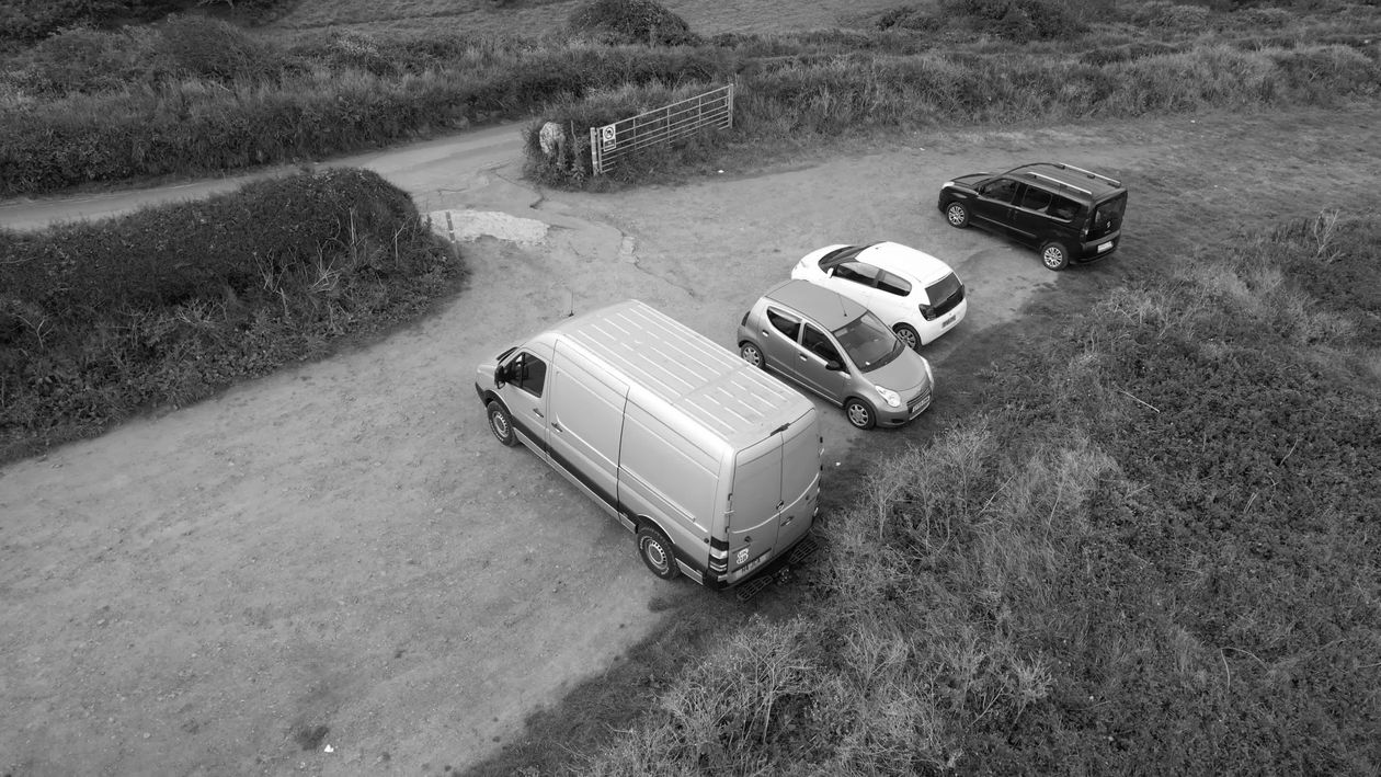 Vehicles In Rural Community Aerial View of Parked Vehicles on Rural Road Free Stock Video Footage ...