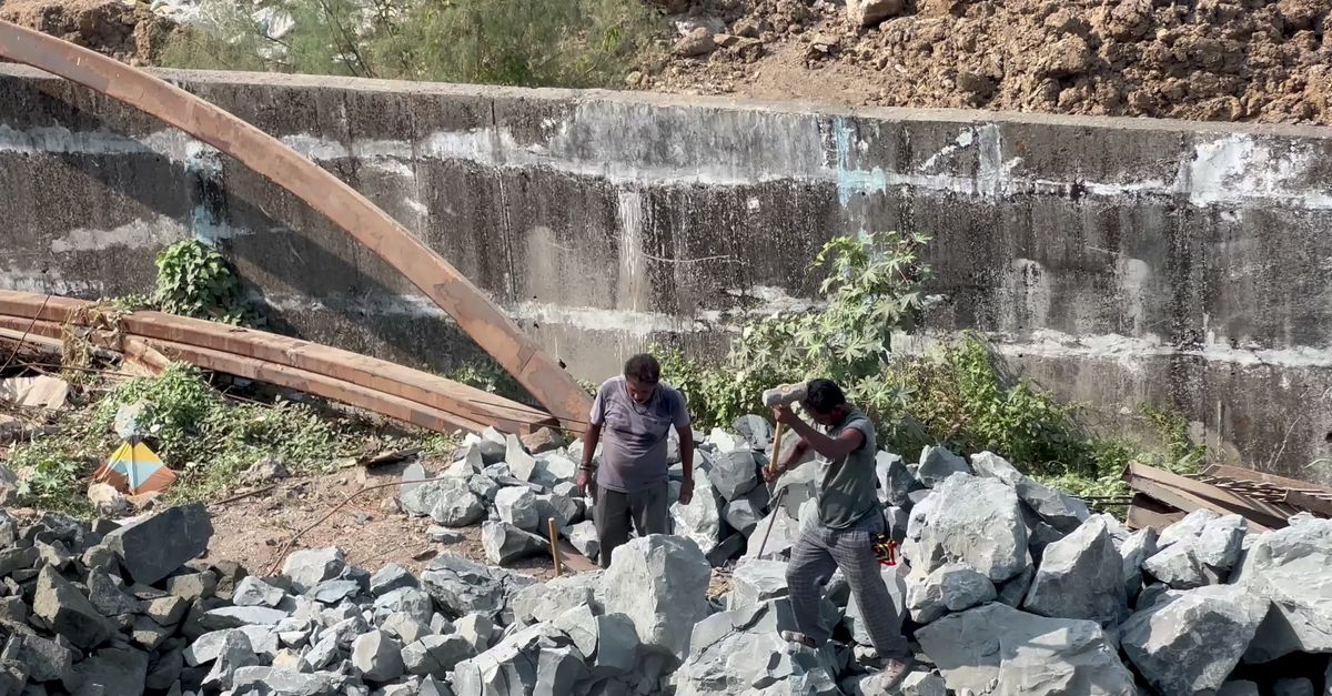 Hoconstruction Inside Rocks Laborers Breaking Rocks at Construction Site Free Stock Video Footage ...