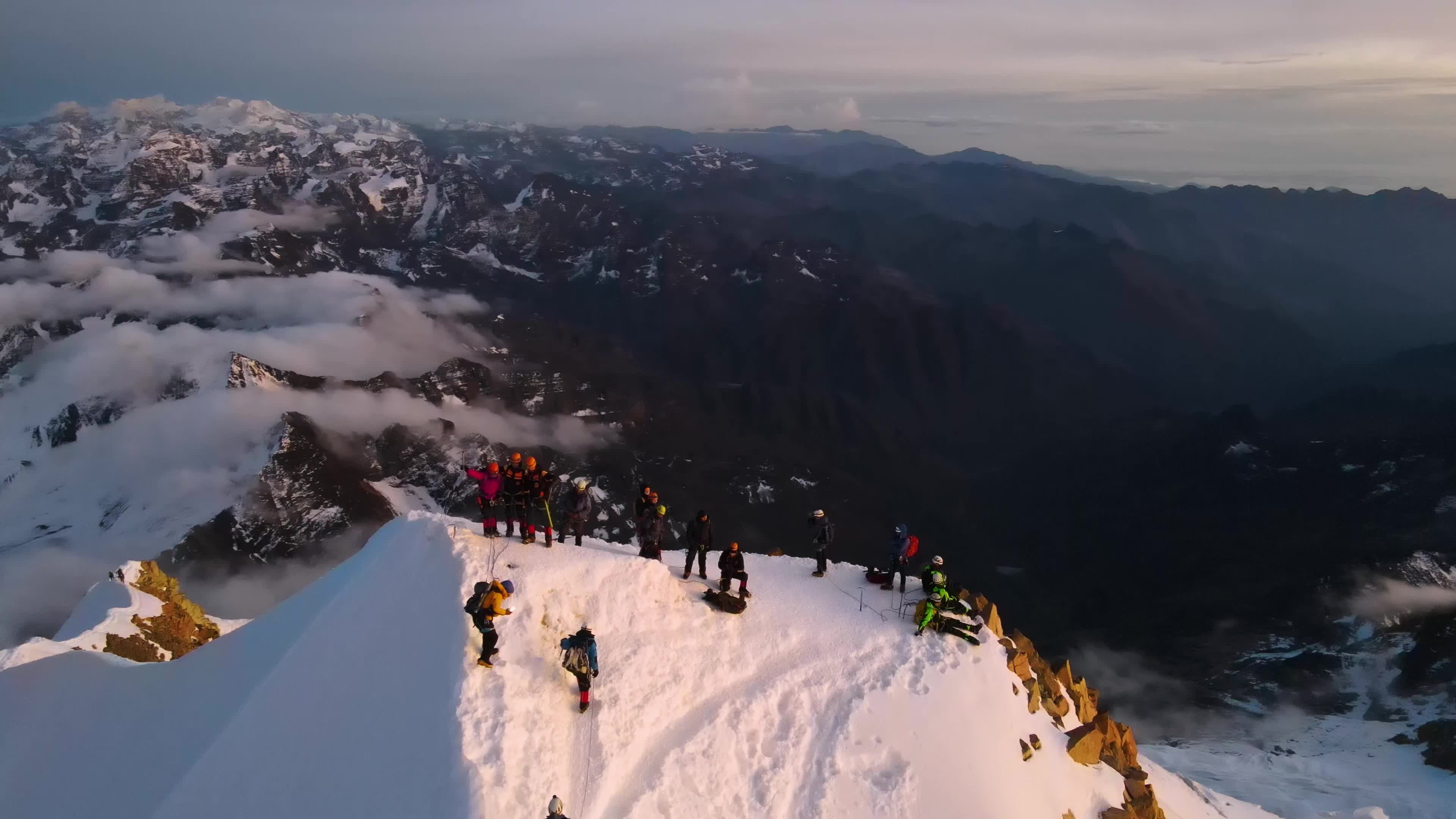 Breathtaking Drone View of Snowy Mountain Sunrise Free Stock Video ...