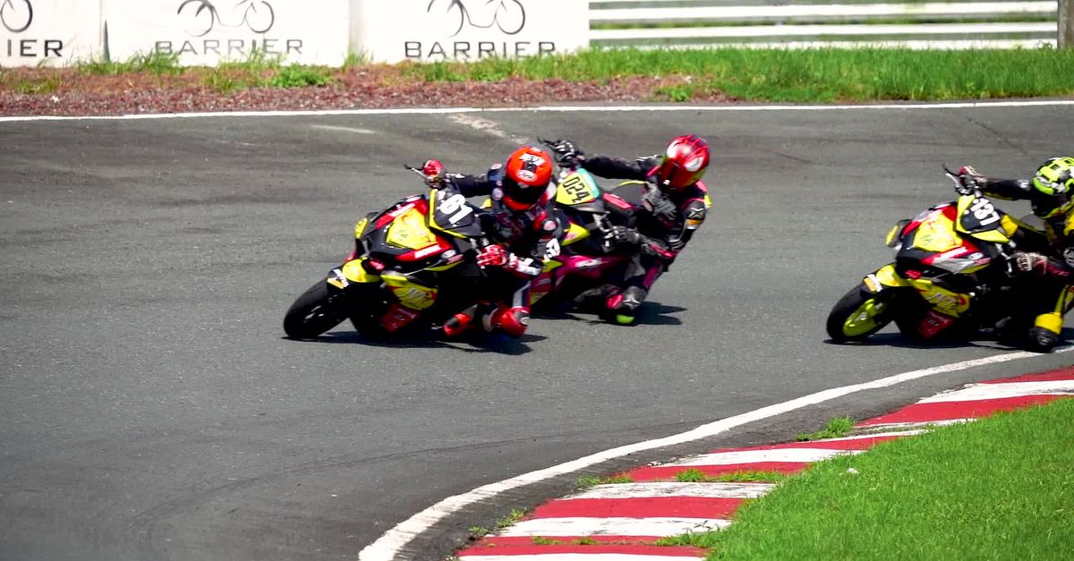 Motorcycle Racing Scene Exciting Motorcycle Race on Curved Track Free Stock Video Footage ...