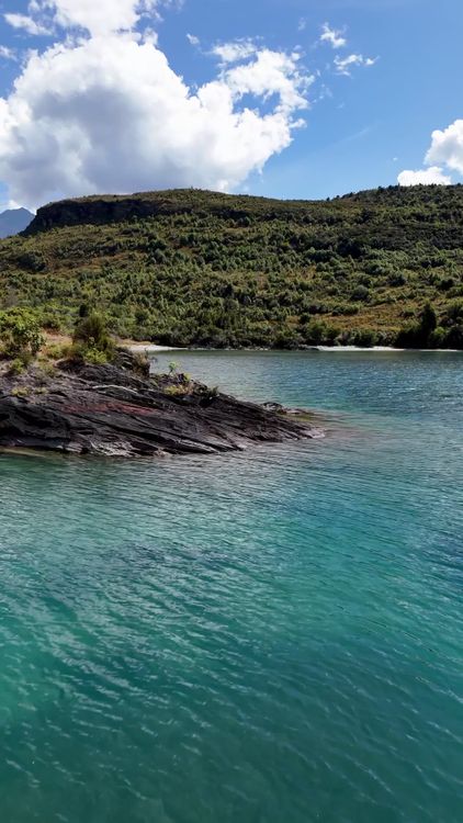 Serene Lakeside View with Mountain Backdrop Free Stock Video Footage ...