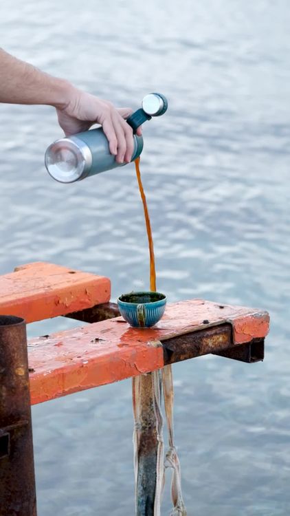 Serene Seaside Moment with Coffee Pour Free Stock Video Footage ...