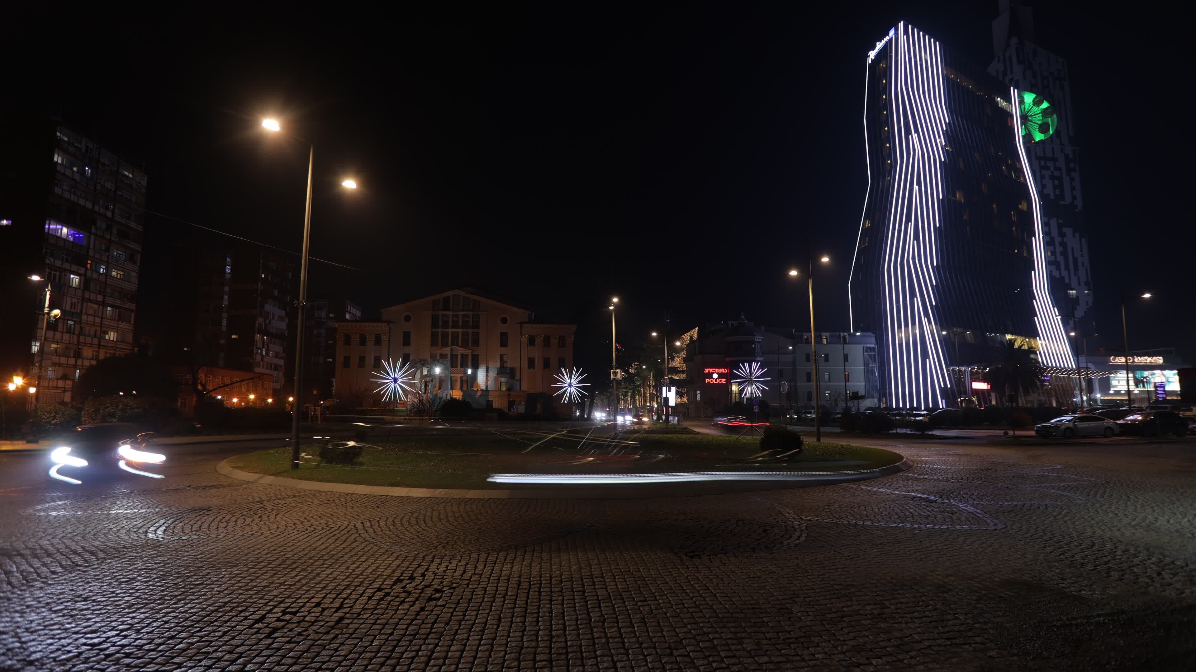 vibrant nighttime cityscape with illuminated buildings 30390610 — free pexels stock footage