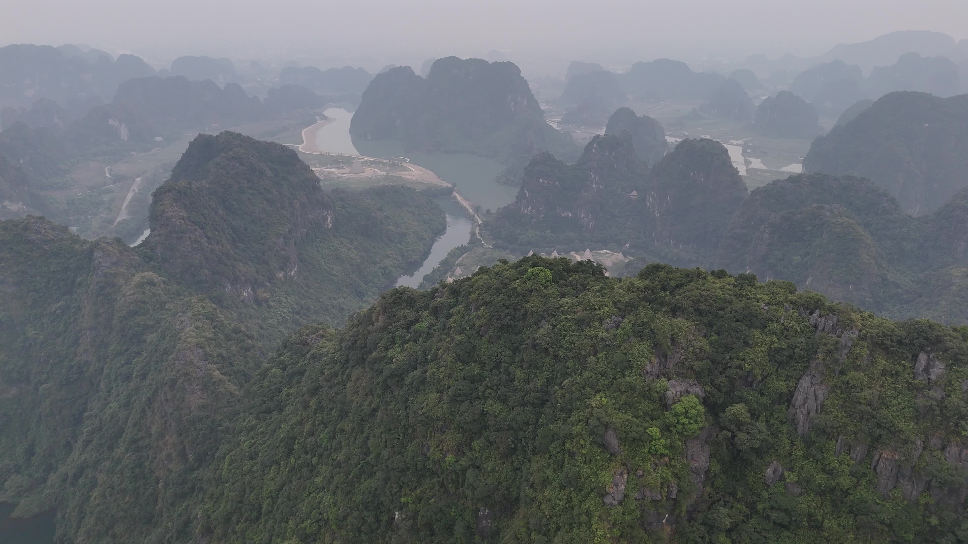 Aerial View of Ninh Binh's Misty Mountainscape Free Stock Video Footage ...