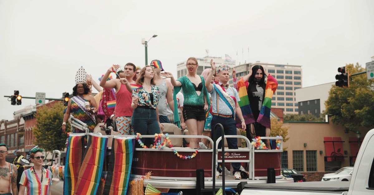 People On Board A Float Participating In A Street Parade Free Stock ...