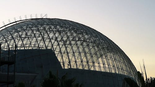 A Dome Shape Building Of Glass And Steel