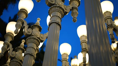 Rows Of Street Lights Post Of Different Designs On Display 