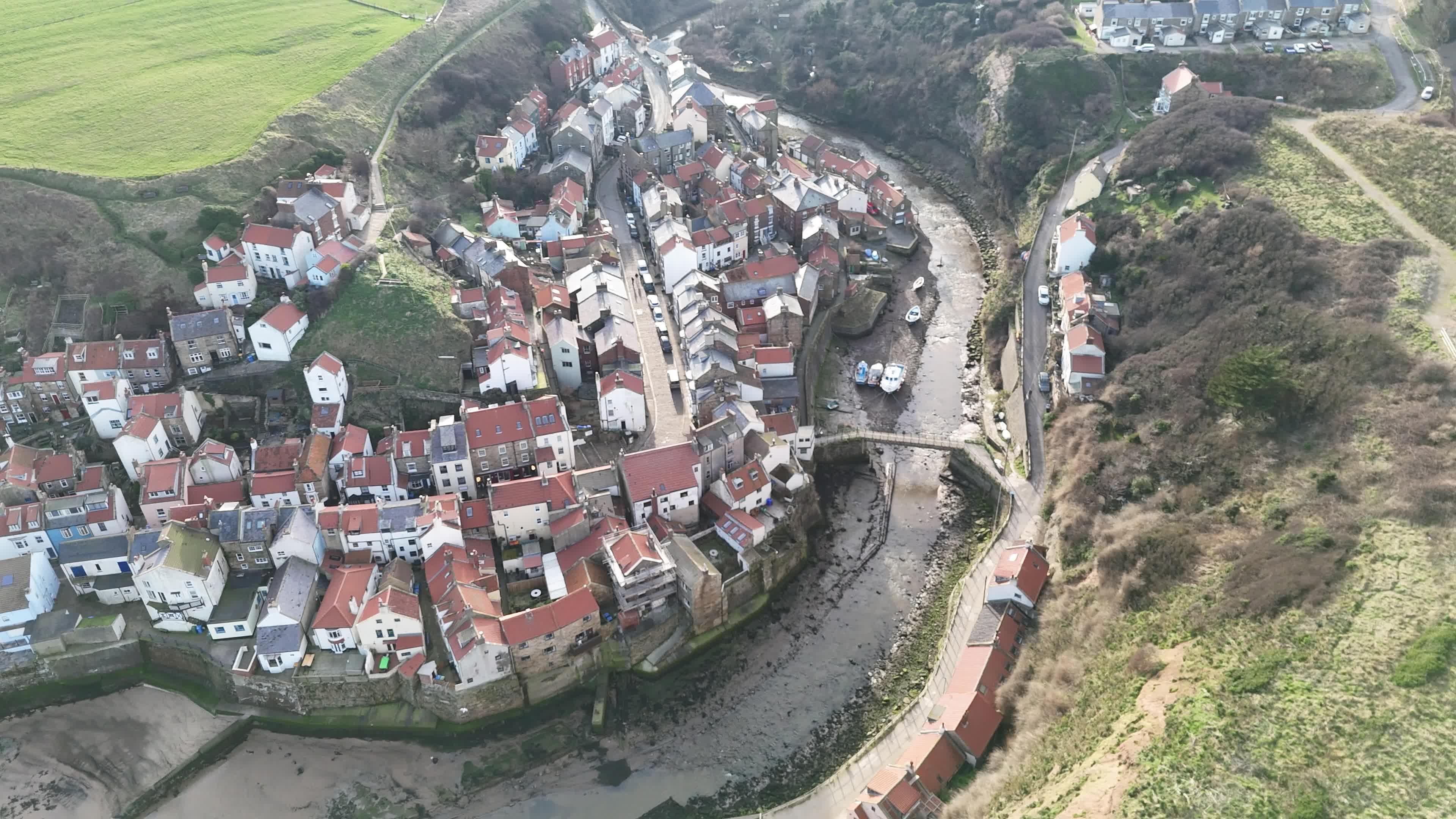 Aerial View of Coastal Town with Cliffside Free Stock Video Footage ...