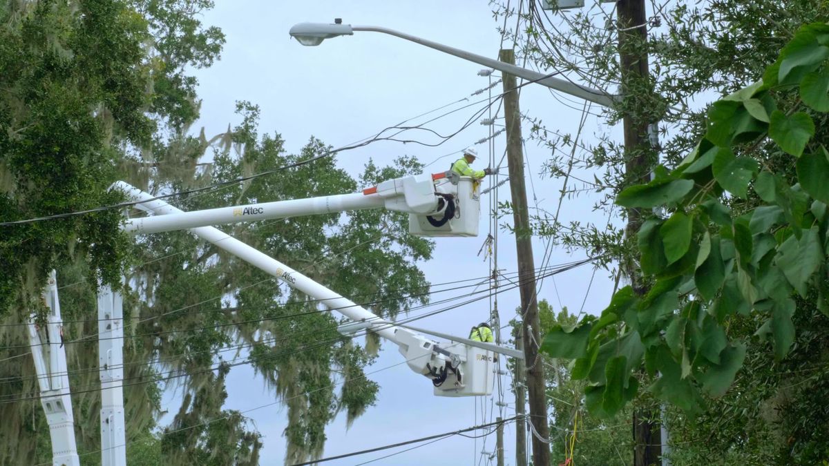 Utility Worker Repairs Powerlines from Lift Free Stock Video Footage ...