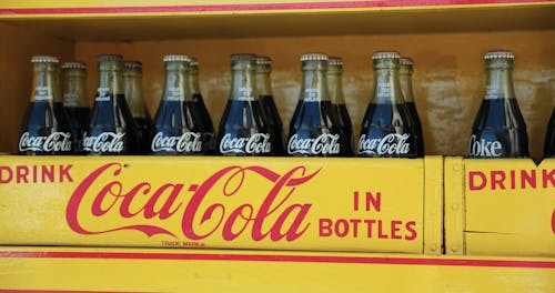 Two Cases Of Carbonated Drinks In A Bottle
