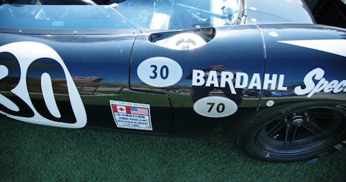 A Vintage Race Car On Display In A Car Show