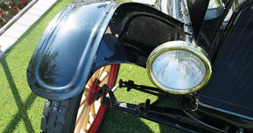 The Headlight Of A Vintage Car In Public Display