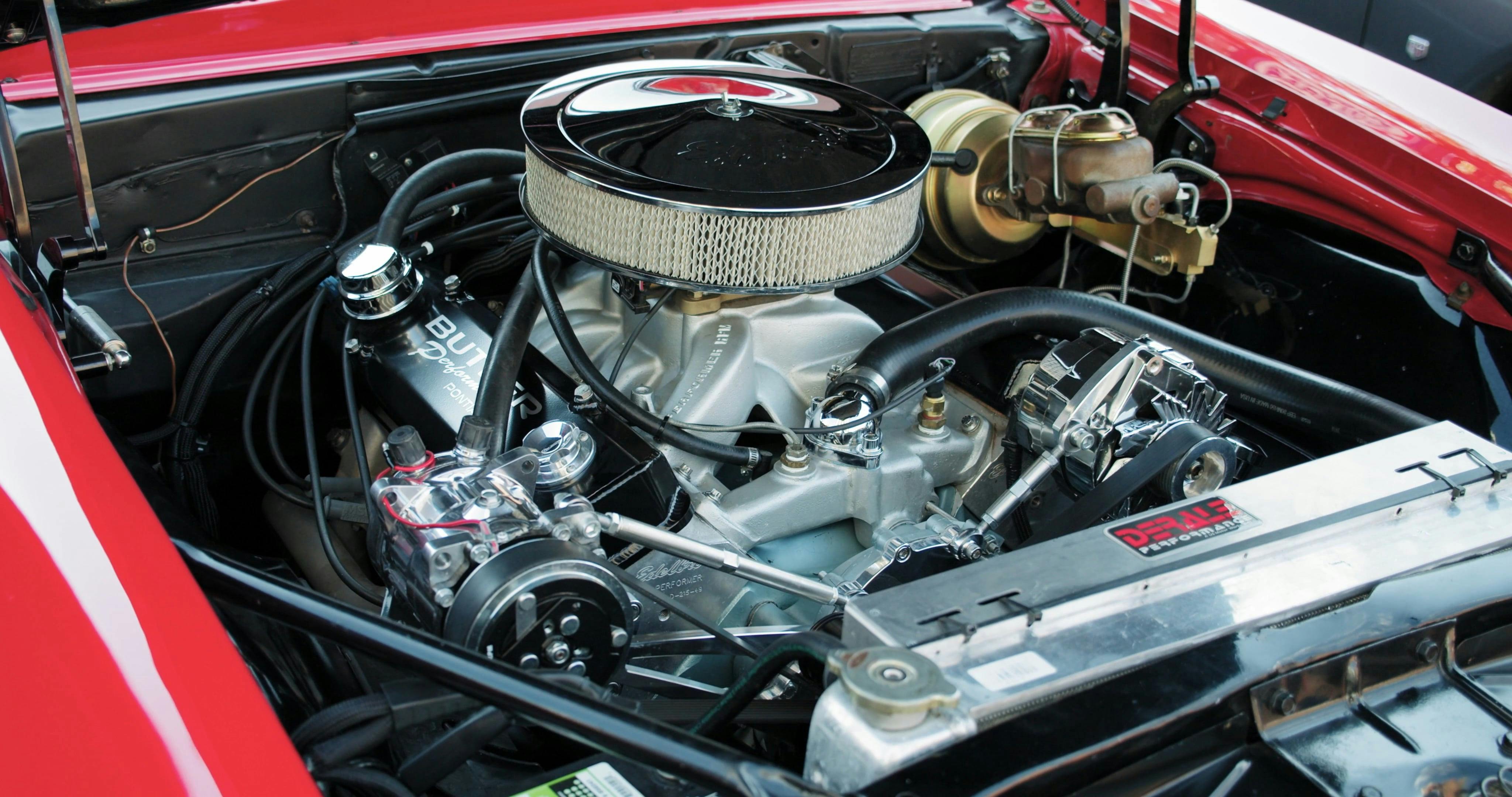 A Motor Vehicle Engine Installed In A Car Engine Compartment · Free