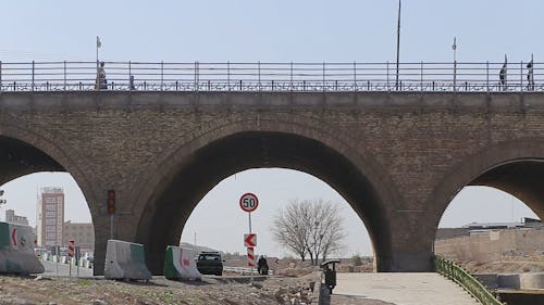 Roads Construction Under The Arched Pillar Of A Bridge