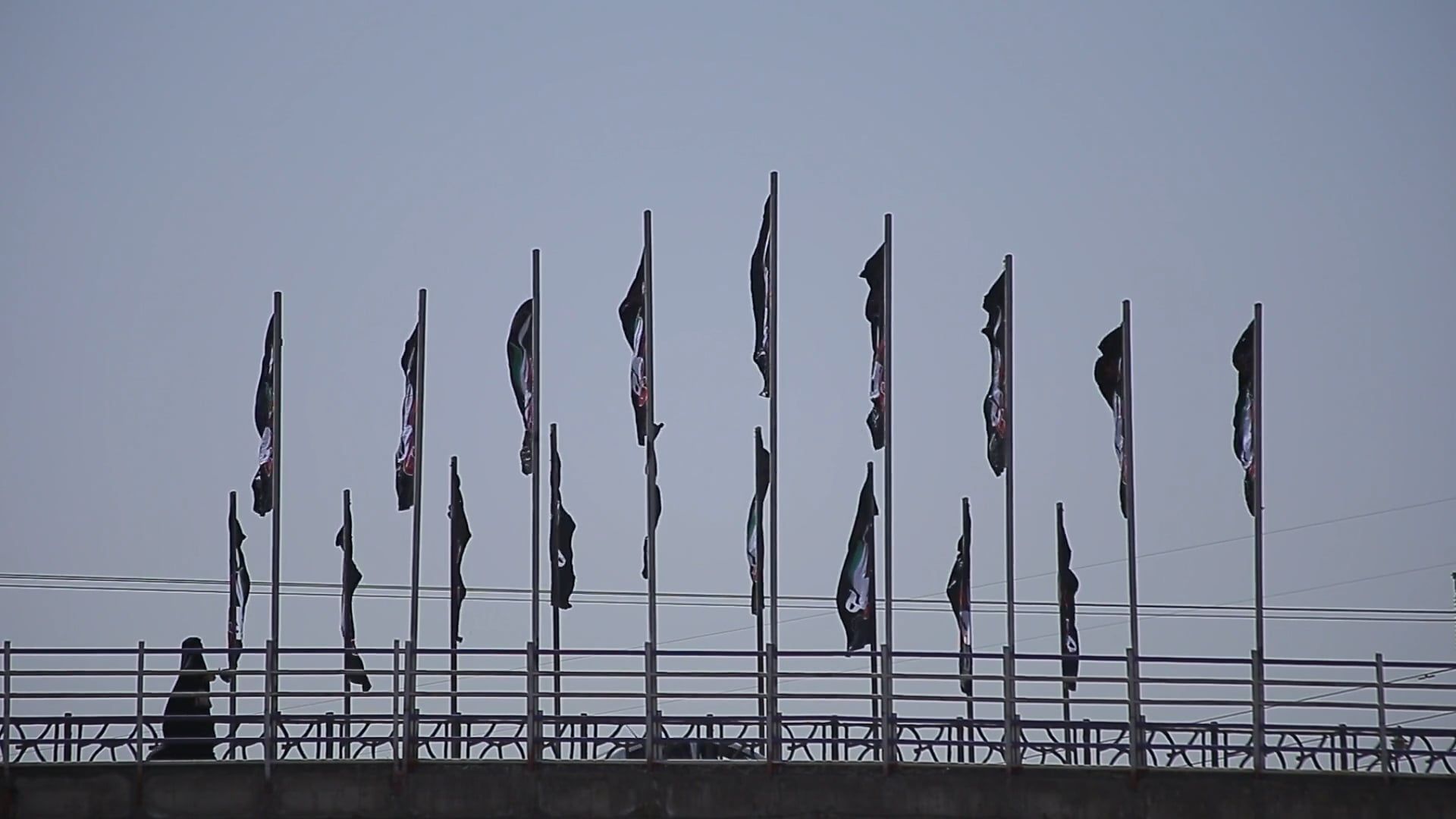 Flags On Flag Poles Swaying Wildly With The Strong Blows Of The Wind ...