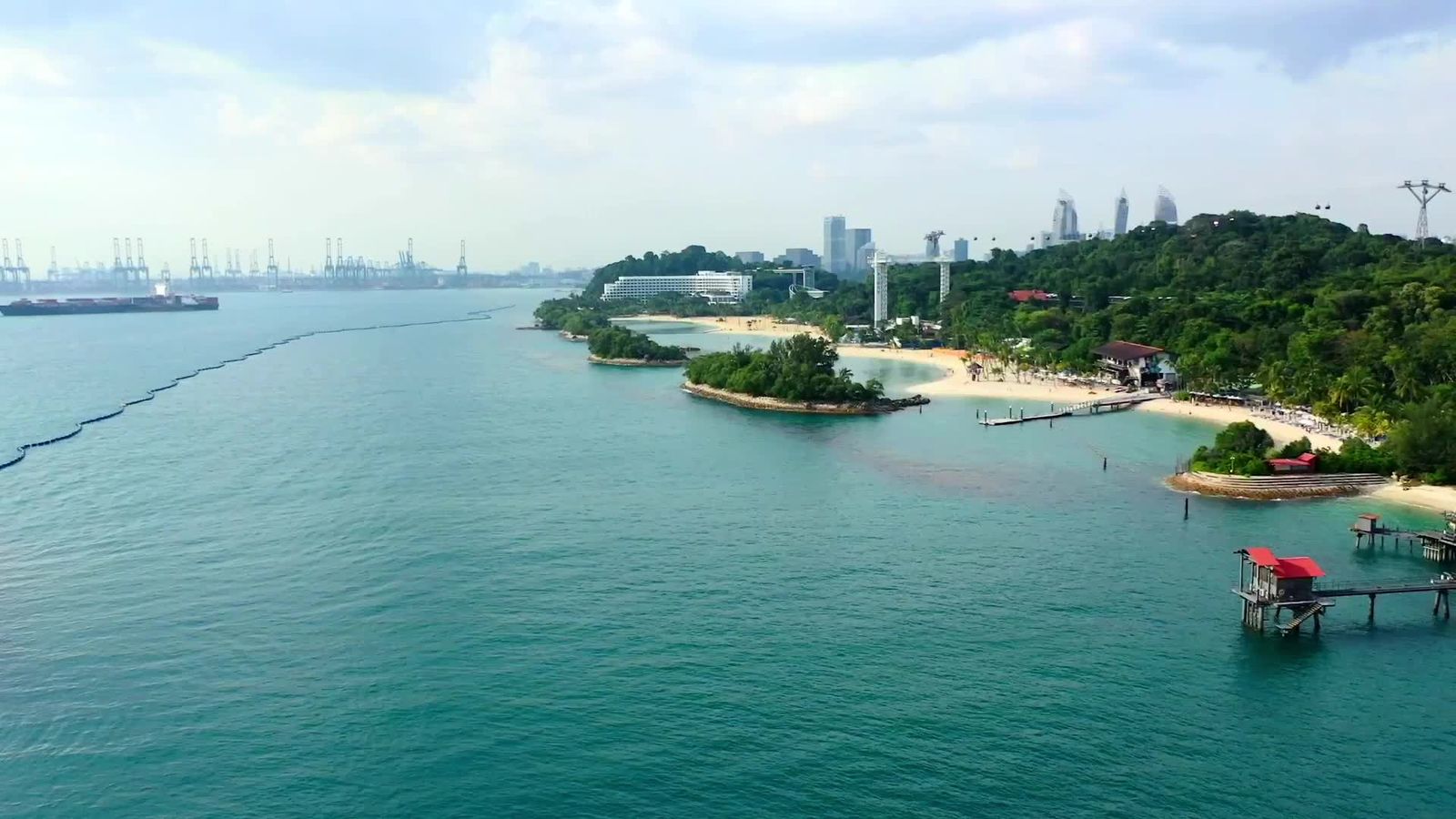 Aerial View of Tropical Beach and City Skyline Free Stock Video Footage ...