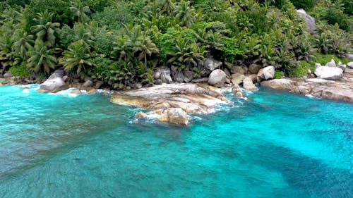 Beach With Clear Blue Water