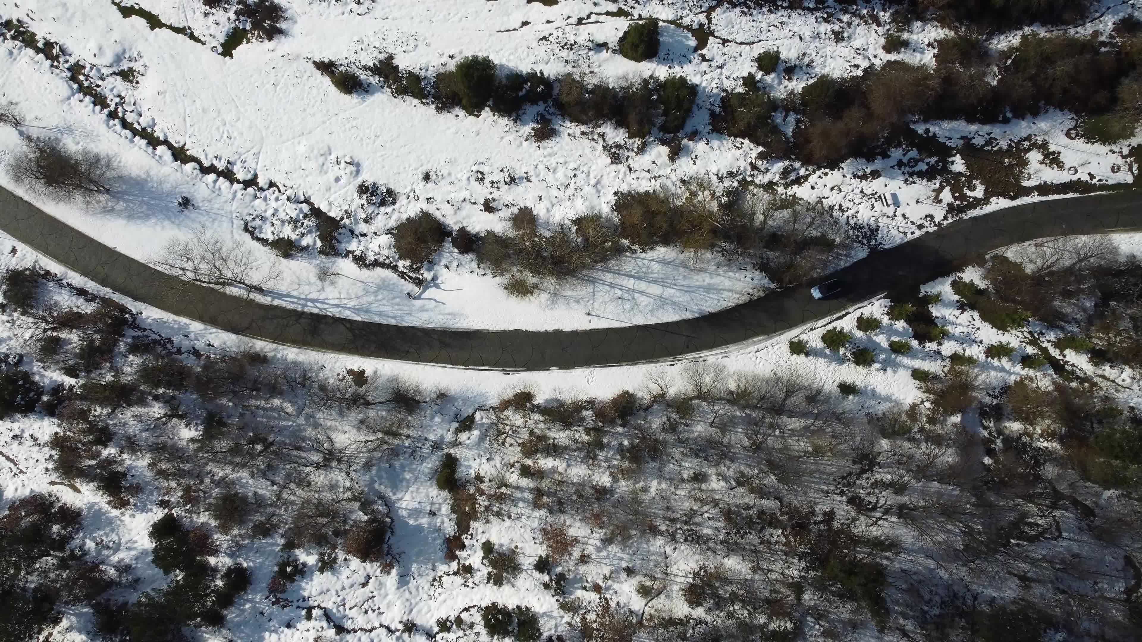 Aerial View of Snowy Mountain Road in Winter Free Stock Video Footage ...