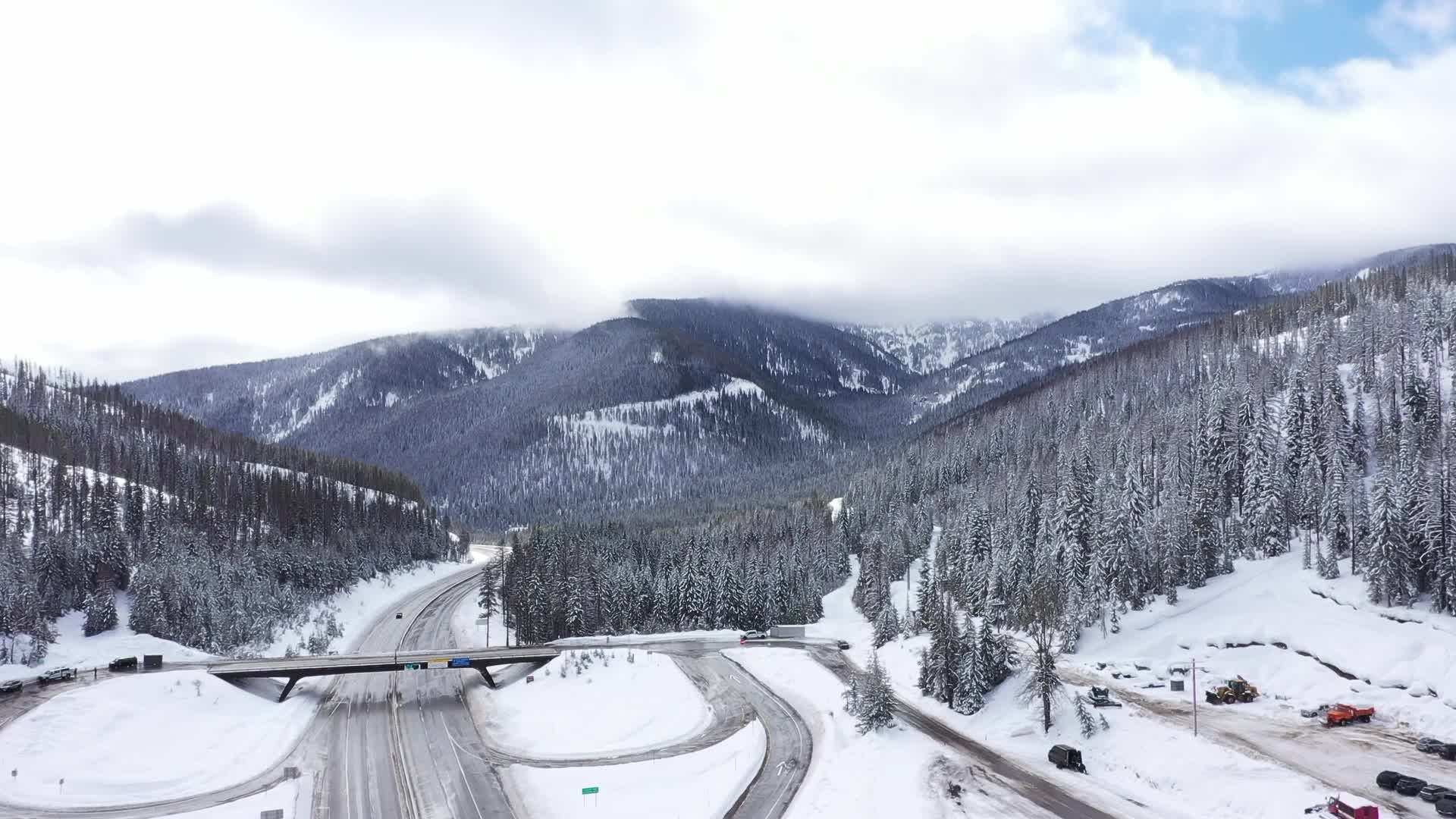 Drone Aerial View of Snowy Mountain Highway Free Stock Video Footage ...